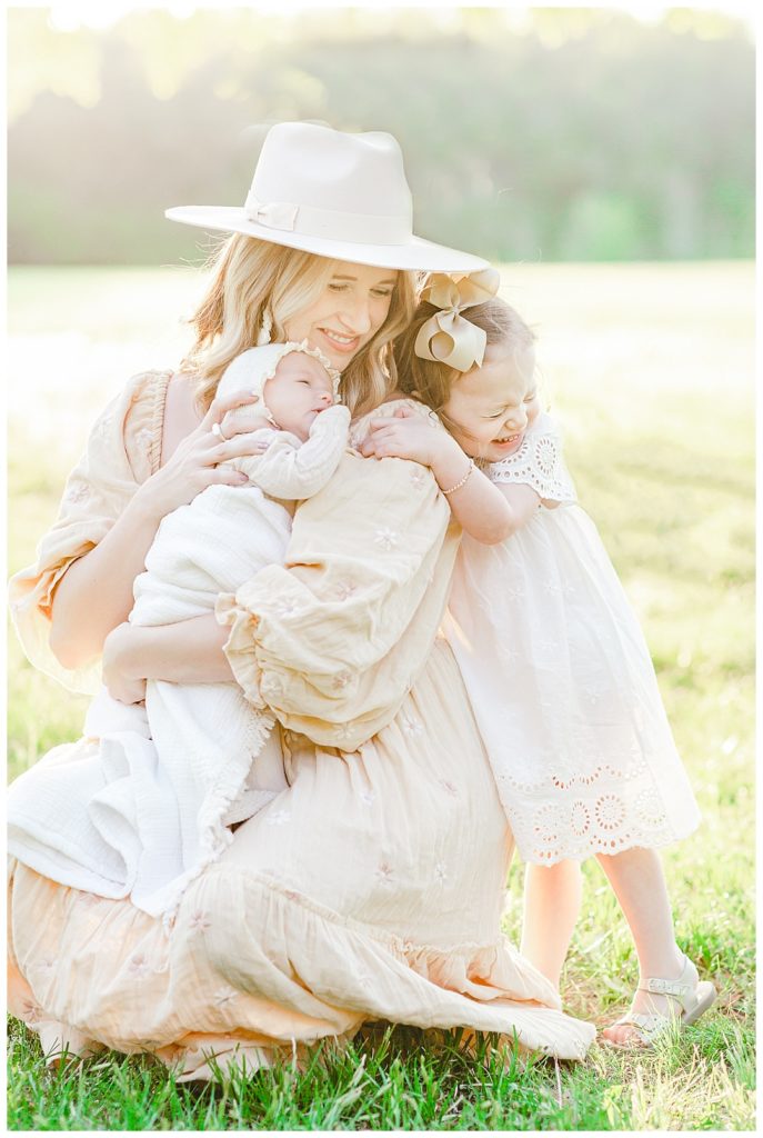 Huntsville Motherhood Photographer, mom with baby and toddler girl hugging