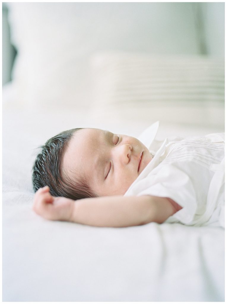Huntsville Newborn baby boy lying on bed