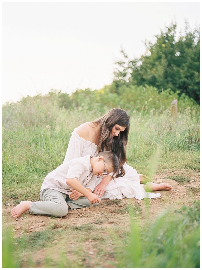 Grace Paul Photography sitting in grass with son